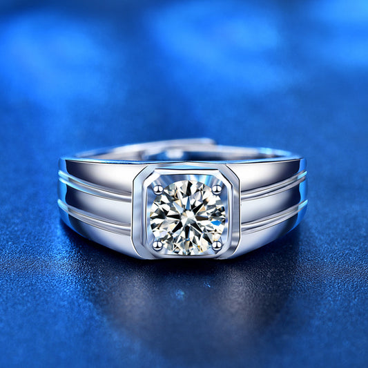 Front view of men’s moissanite signet ring with octagonal bezel, round center stone and polished 925 sterling silver band.