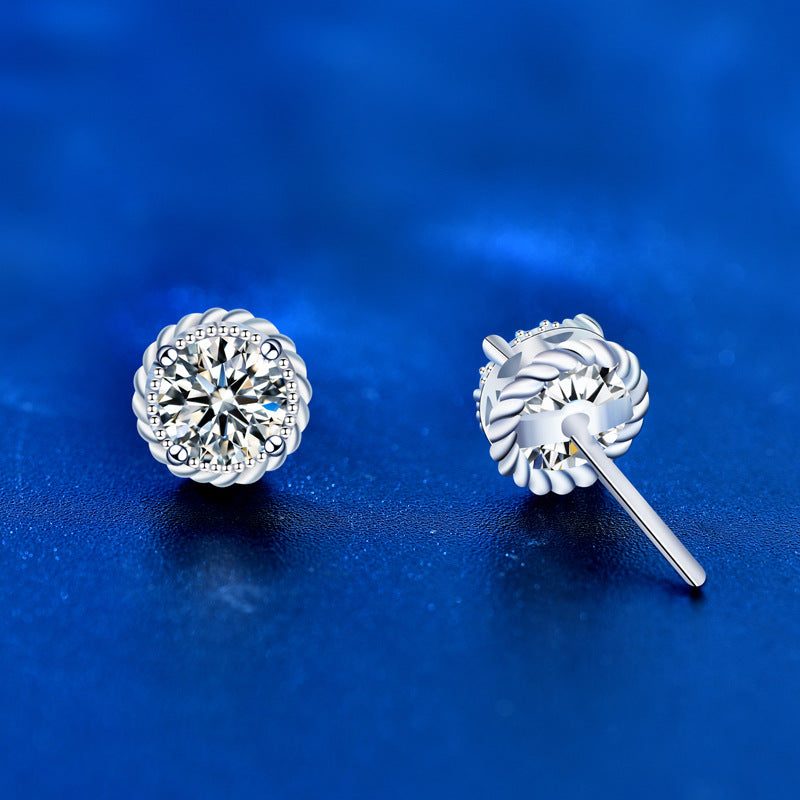 Front and back of sterling silver moissanite stud earrings with twisted rope halo and post backs