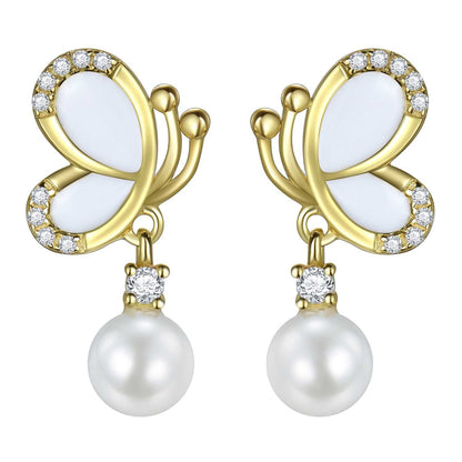 White enamel butterfly pearl dangle earrings in 18K gold-plated 925 silver with CZ accents, front view.