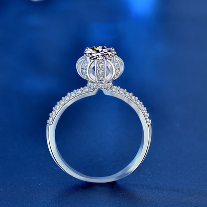 Side profile showing blossom crown gallery and pavé band on 1 ct moissanite ring.