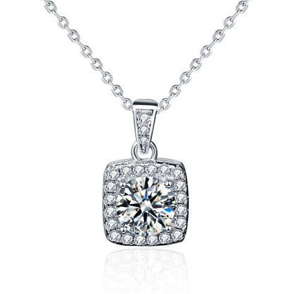 Front view of sterling silver moissanite square halo pendant necklace on white background.