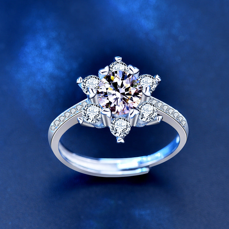 Top view of snowflake halo moissanite engagement ring in rhodium-plated sterling silver.