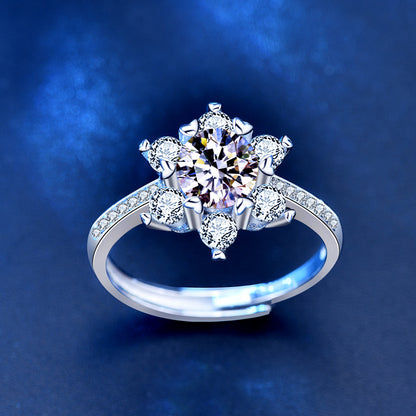 Top view of snowflake halo moissanite engagement ring in rhodium-plated sterling silver.