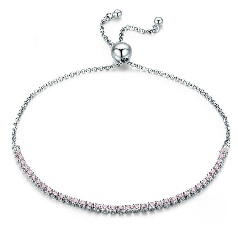 Silver slider bracelet with a line of pink CZ stones