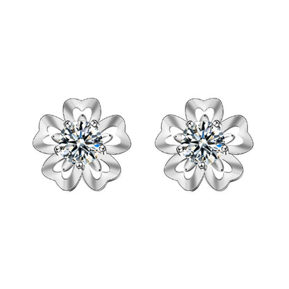 White-background render of cherry-blossom moissanite stud earrings in 925 sterling silver.