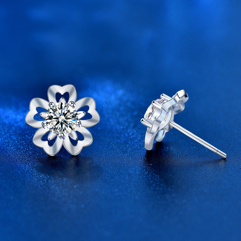 Front and side view of cherry-blossom stud earrings with post backs.