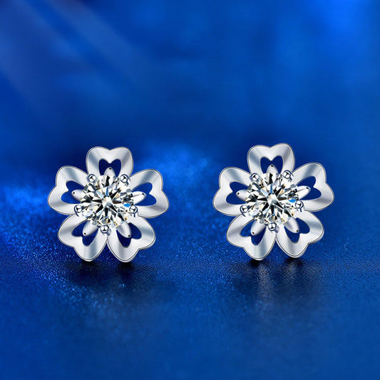 Front view of cherry-blossom moissanite stud earrings in sterling silver