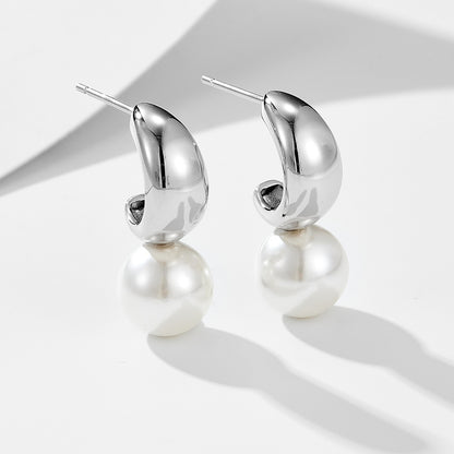 Rhodium-plated sterling silver C-hoop created pearl dangle earrings — close-up.