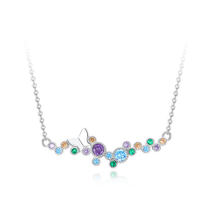 Sterling silver butterfly necklace with rainbow CZ bubble design on a white background.