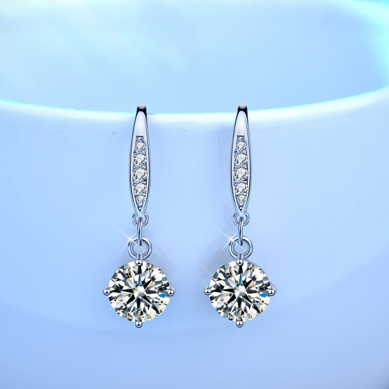 Front view of rhodium-plated 925 sterling silver moissanite dangle earrings with CZ-pavé ear wires