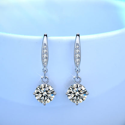 Front view of rhodium-plated 925 sterling silver moissanite dangle earrings with CZ-pavé ear wires