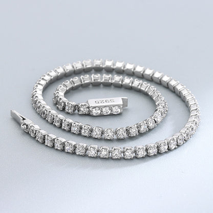 Close-up of coiled round CZ tennis bracelet with 925 stamp visible