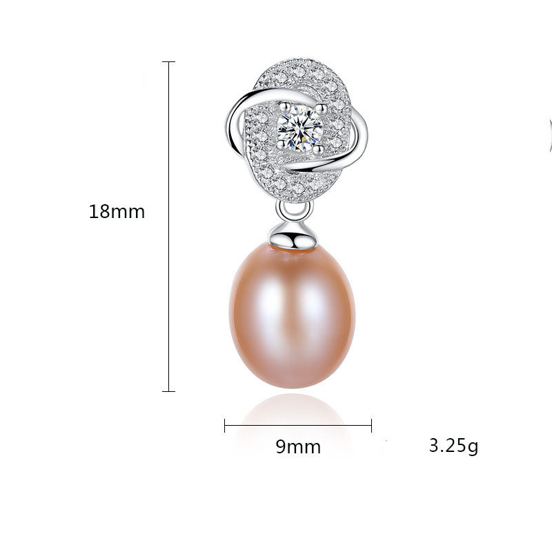 Freshwater pearl CZ dangle in rhodium-plated 925 silver; overall drop 18 mm, pearl width 9 mm, total pair weight 3.25 g.