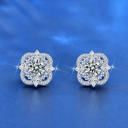Front view of quatrefoil moissanite stud earrings with pavé CZ halo in 925 sterling silver