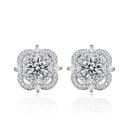 White background studio shot of quatrefoil moissanite stud earrings in 925 sterling silver