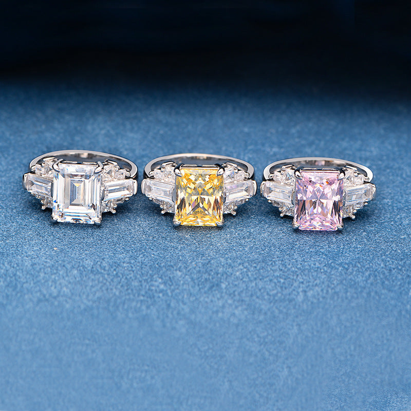 Radiant-cut CZ cocktail rings in rhodium-plated 925 silver with baguette accents—white, yellow and pink centers.