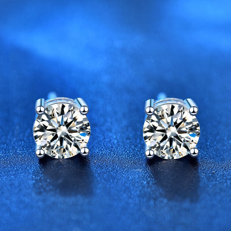 Front view of four-prong moissanite stud earrings in rhodium-plated 925 sterling silver