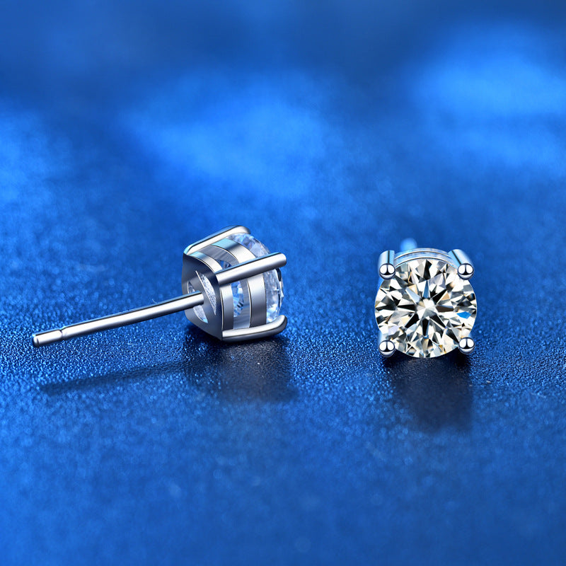 Side and back view showing basket setting and posts of moissanite sterling-silver stud earrings