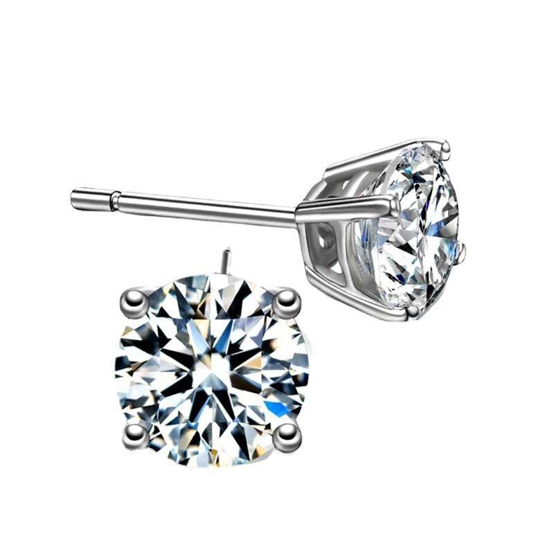 White-background close-up of single moissanite stud earring in sterling silver four-prong setting