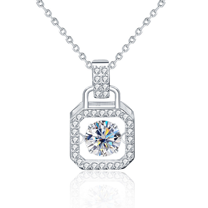 Studio image of sterling silver padlock pendant with moissanite and CZ stones.