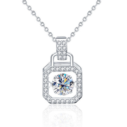 Studio image of sterling silver padlock pendant with moissanite and CZ stones.