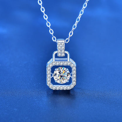Sterling silver padlock pendant necklace with dancing moissanite and CZ accents.