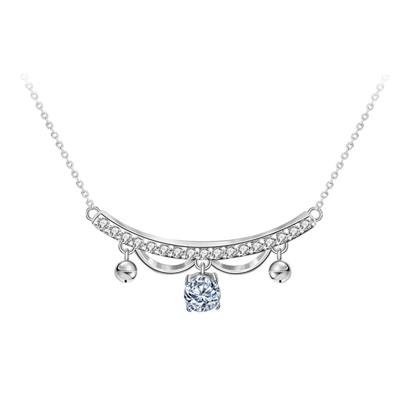 Studio product image of sterling silver moissanite and CZ lace tassel drop necklace on white background.