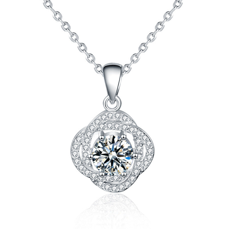 Isolated product shot of 1 carat moissanite rose flower pendant necklace in 925 sterling silver on white background