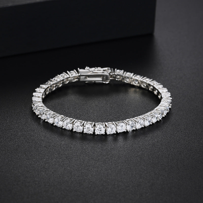 Unisex CZ tennis bracelet in rhodium plated 925 sterling silver on black background