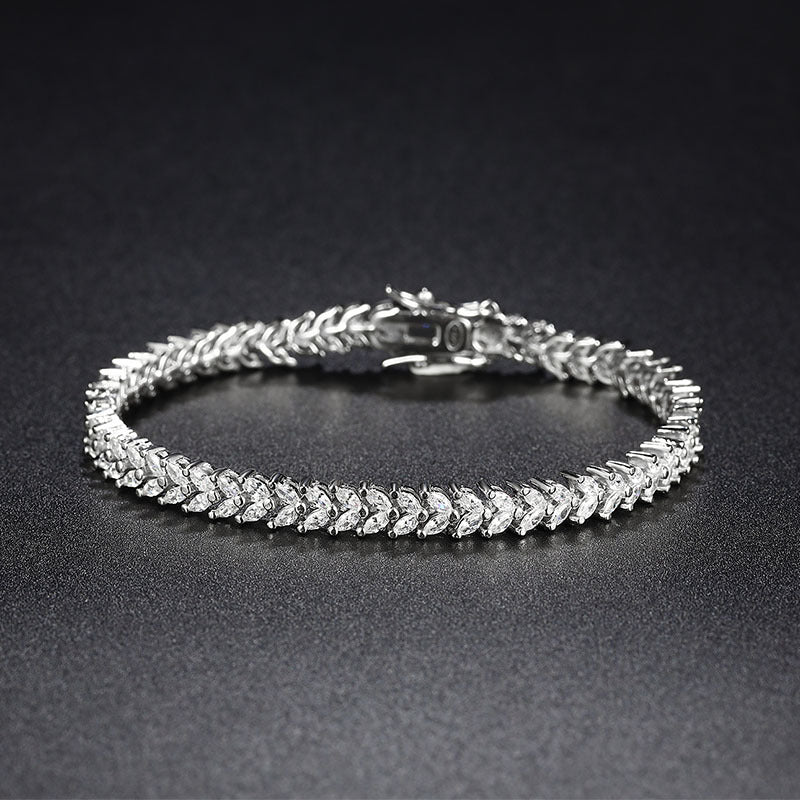 Close-up of wheat-link CZ bracelet in rhodium-plated 925 sterling silver.