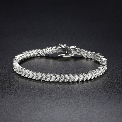 Close-up of wheat-link CZ bracelet in rhodium-plated 925 sterling silver.
